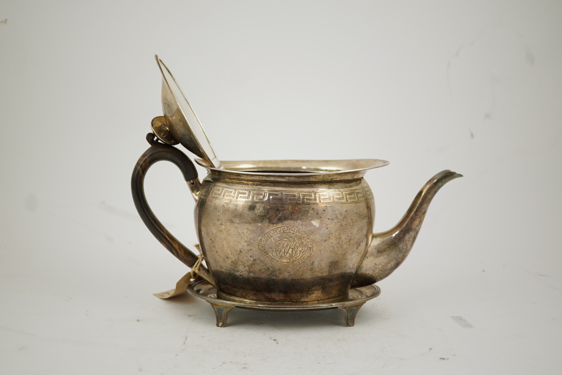 A George III silver oval teapot and matching oval stand, by John Eames